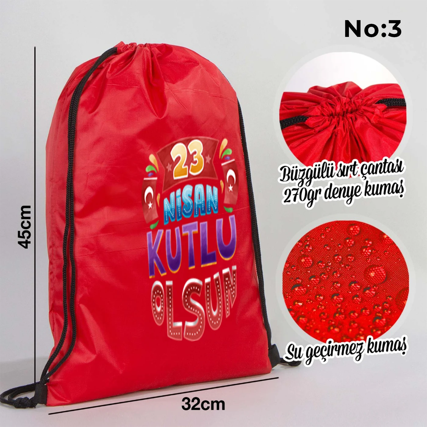 32x45 cm kırmızı büzgülü sırt çantası üzerinde beyaz “23 Nisan Ulusal Egemenlik ve Çocuk Bayramı” baskısı, balonlu çocuk figürleri ve kutlama temalı sınıf arka planı