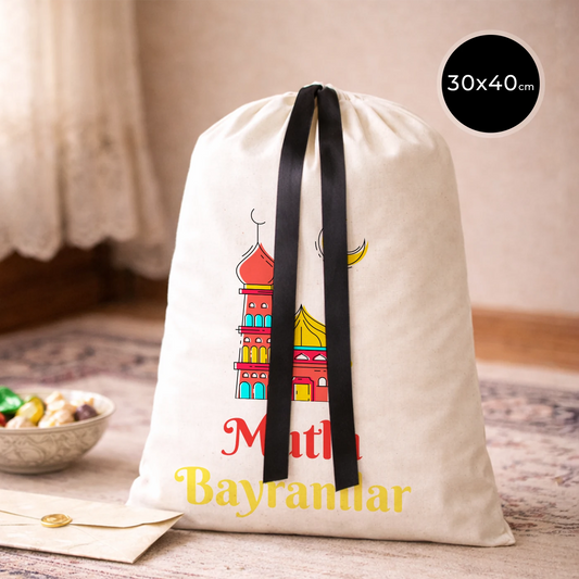 30x40 cm ölçülerinde, siyah kurdelalı, cami figürlü ‘Mutlu Bayramlar’ baskılı bez kese bayram çantası