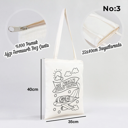35x40 cm beyaz fermuarlı bez çanta üzerinde boyamaya uygun “Yaşasın 23 Nisan” yazılı, kalem üstünde oturan çocuk illüstrasyonlu siyah beyaz baskı