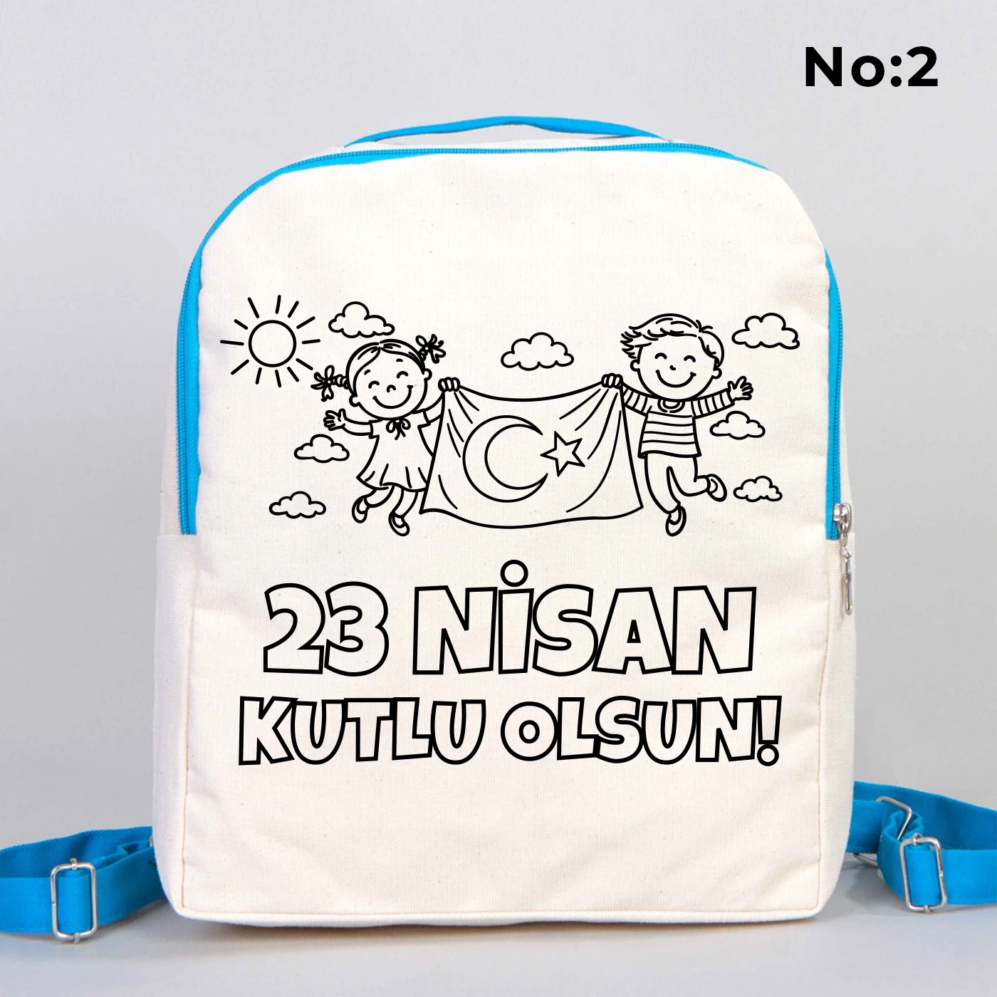 25x32x10 cm krem renkli turkuaz fermuar ve askı detaylı çocuk sırt çantası üzerinde boyamaya uygun “23 Nisan Kutlu Olsun” yazılı sıcak hava balonu temalı siyah beyaz baskı