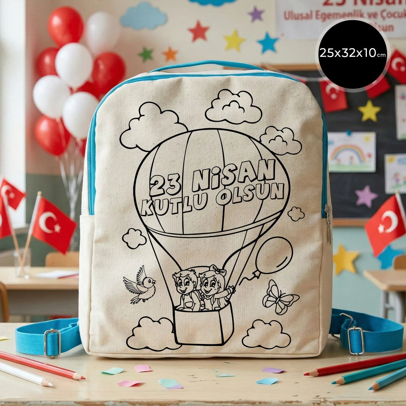 25x32x10 cm krem renkli turkuaz fermuar ve askı detaylı çocuk sırt çantası üzerinde boyamaya uygun “23 Nisan Kutlu Olsun” yazılı sıcak hava balonu temalı siyah beyaz baskı