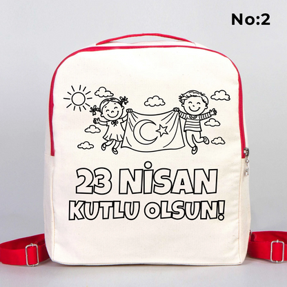 25x32x10 cm krem renkli kırmızı fermuar ve askı detaylı çocuk sırt çantası üzerinde boyamaya uygun “23 Nisan Kutlu Olsun” yazılı siyah beyaz baskı