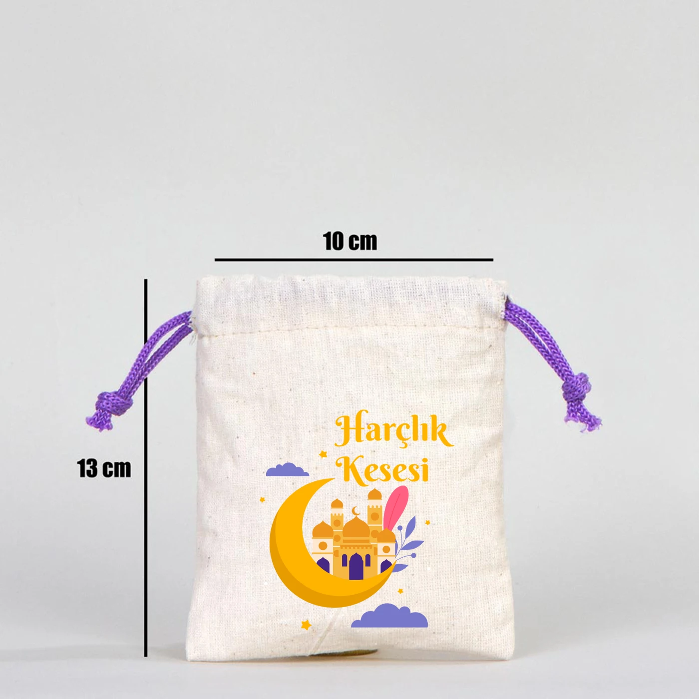 10 cm genişlik ve 13 cm yükseklik ölçülerine sahip, mor ipli, pamuk bez bayram harçlık kesesi ölçü detaylı görünüm