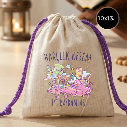 Mor ipli, 10x13 cm ölçülerinde, pamuk bezden üretilmiş bayram harçlık kesesi, şeker desenli “Harçlık Kesem – İyi Bayramlar” yazılı tasarım