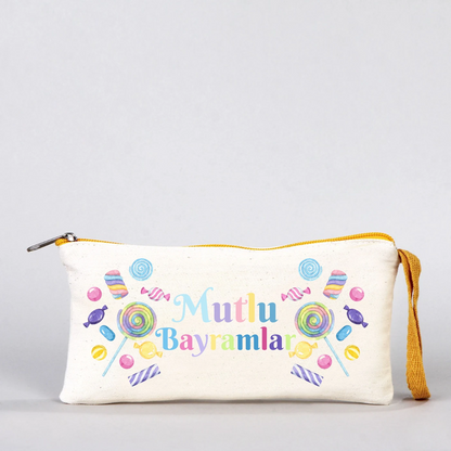 Bayram temalı 21x10 cm kanvas fermuarlı kalem çantası, sarı fermuar, “Mutlu Bayramlar” yazılı cami ve yıldız motif
