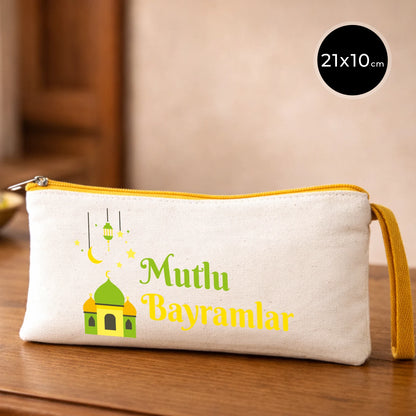 Bayram temalı 21x10 cm kanvas fermuarlı kalem çantası, sarı fermuar, “Mutlu Bayramlar” yazılı cami ve yıldız motifli