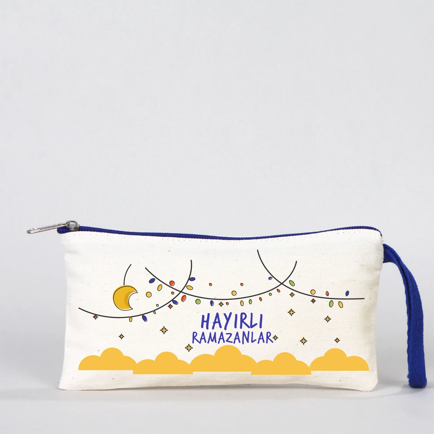Krem kanvas fermuarlı kalemlik 21x10 cm, lacivert detaylı, “İyi Bayramlar” yazılı Bayram hediye kalemlik