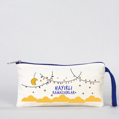 Krem kanvas fermuarlı kalemlik 21x10 cm, lacivert detaylı, “İyi Bayramlar” yazılı Bayram hediye kalemlik