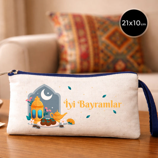 Krem kanvas fermuarlı kalemlik 21x10 cm, lacivert detaylı, “İyi Bayramlar” yazılı Bayram hediyelik kalemlik