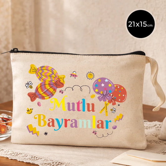 Krem kanvas 21x15 cm elde taşınabilir clutch, siyah fermuarlı, renkli Bayram tasarımlı “Mutlu Bayramlar” yazılı çanta