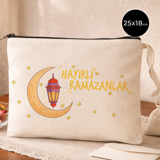 Ramazan temalı 25x18 cm kanvas fermuarlı clutch pouch; siyah fermuar detaylı, “Hayırlı Ramazanlar” yazılı hilal-fener ve yıldız motifli