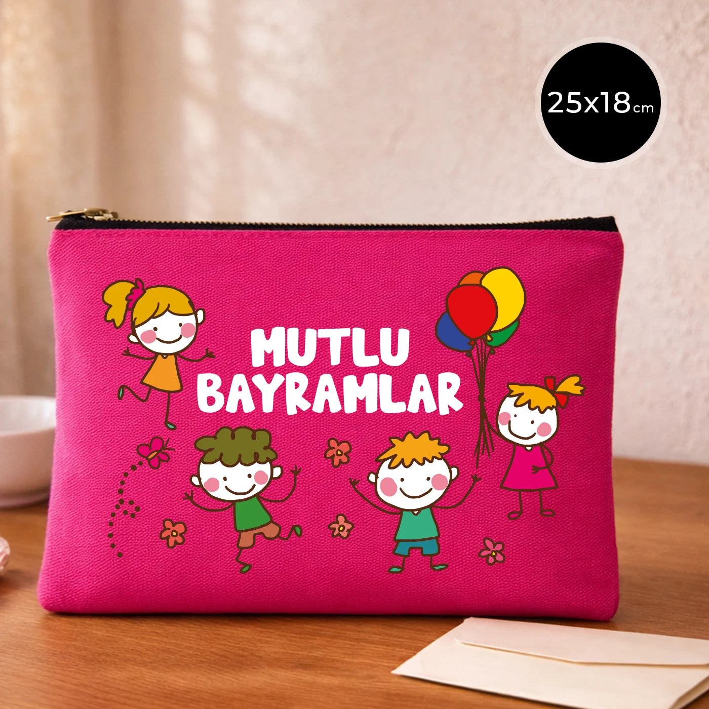 25x18 cm pembe kanvas clutch çanta, siyah fermuarlı, çocuk illüstrasyonlu “Mutlu Bayramlar” baskılı