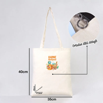 35x40 cm ham renk gabardin bez çanta, 70 cm saplı ve ön ceplere sahip.