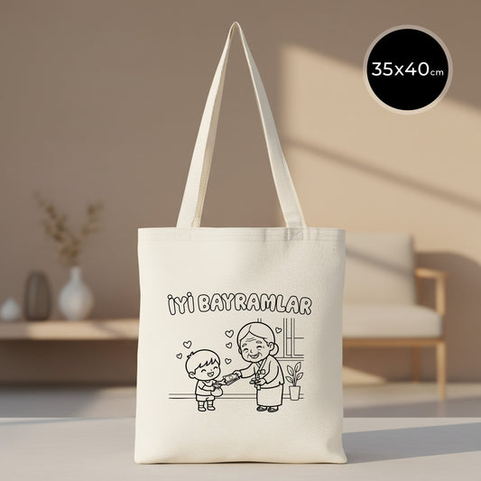 35x40 cm boyanabilir gabardin bez çanta; doğal ham renk tote model, üzerinde “İyi Bayramlar” yazısı ve çocuk–büyükanne bayramlaşma çizimi bulunan bayram çantası / bayram harçlığı kesesi.